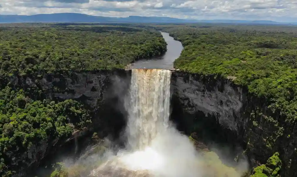 The majestic Kaieteur Falls in Guyana, with water cascading into the gorge below.